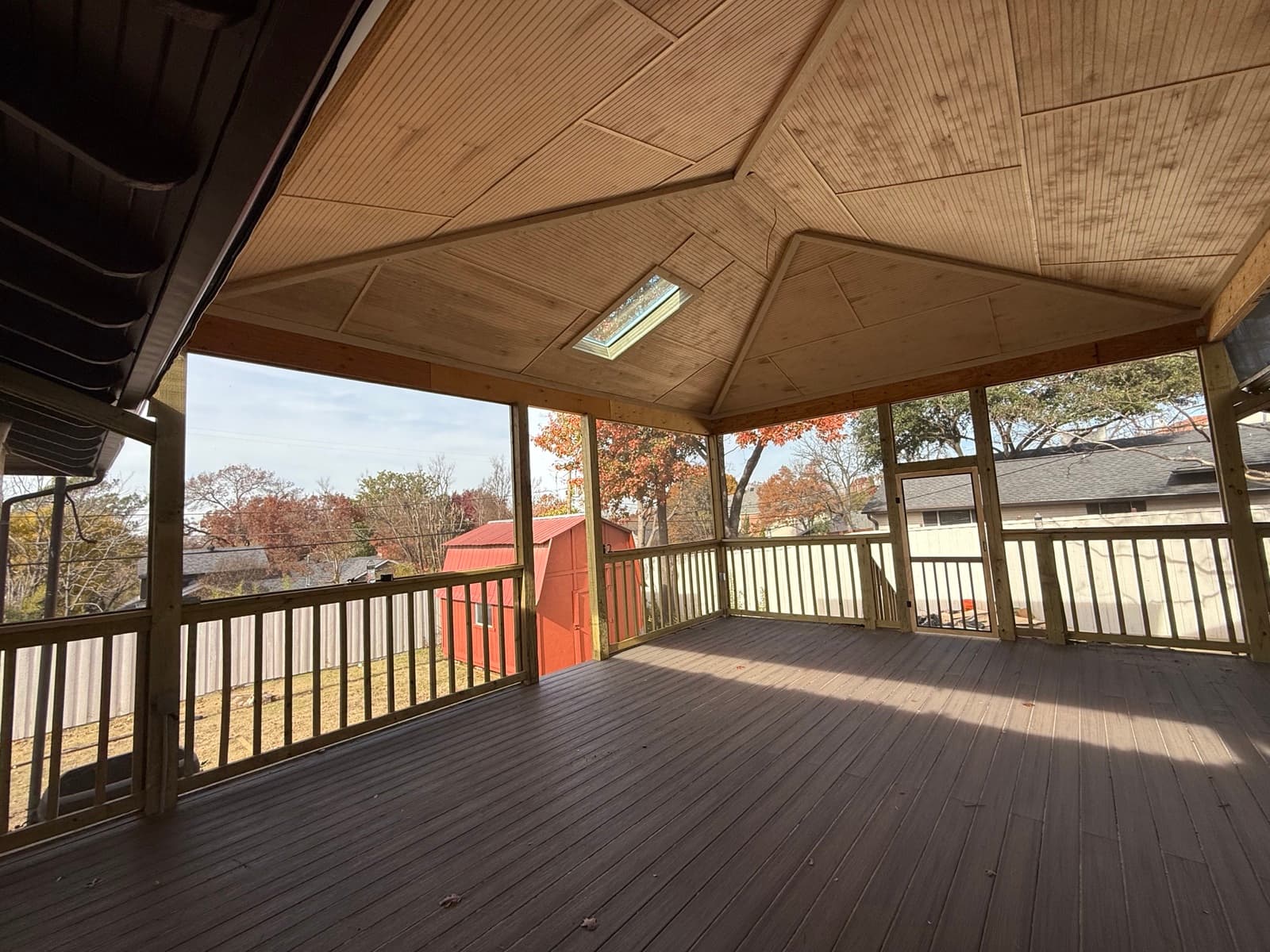 Custom covered patio with vaulted wood ceiling built by Wilson & Co Design Build in St. Augustine, Florida